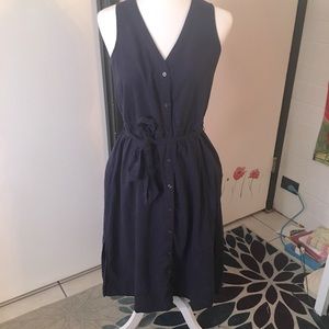 Navy blue button down dress with tie and pockets